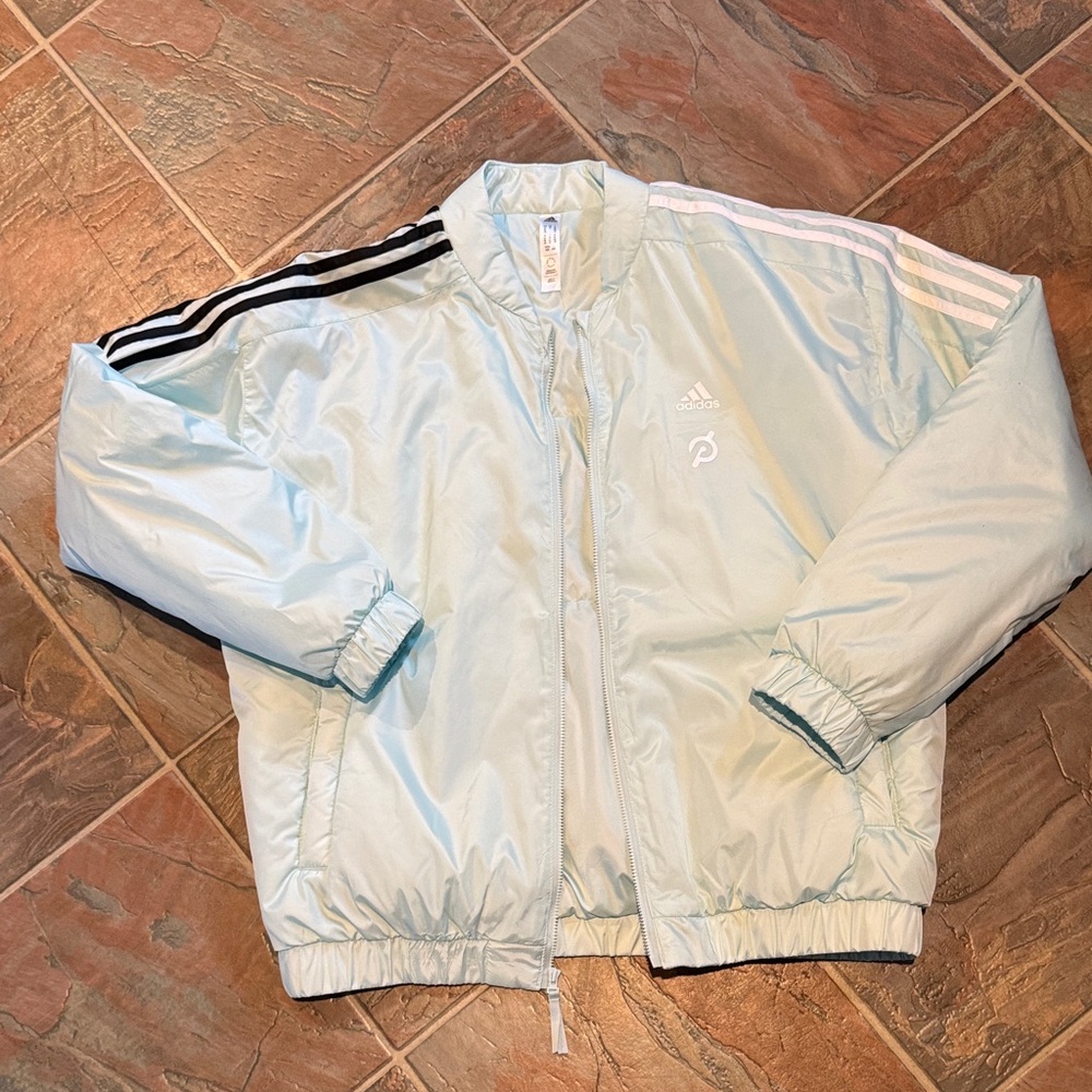 Adidas women’s M Light Blue puffer full zipTrack Jacket Peloton